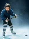 Hockeyspielerin mit Sportmundschutz – Zahnschutz beim Hockey